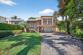 Building Photo - 1042 SE St Lucie Blvd