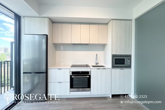 Building Photo - Brand New 1-Bedroom Condo – 500 Sq Ft in M...