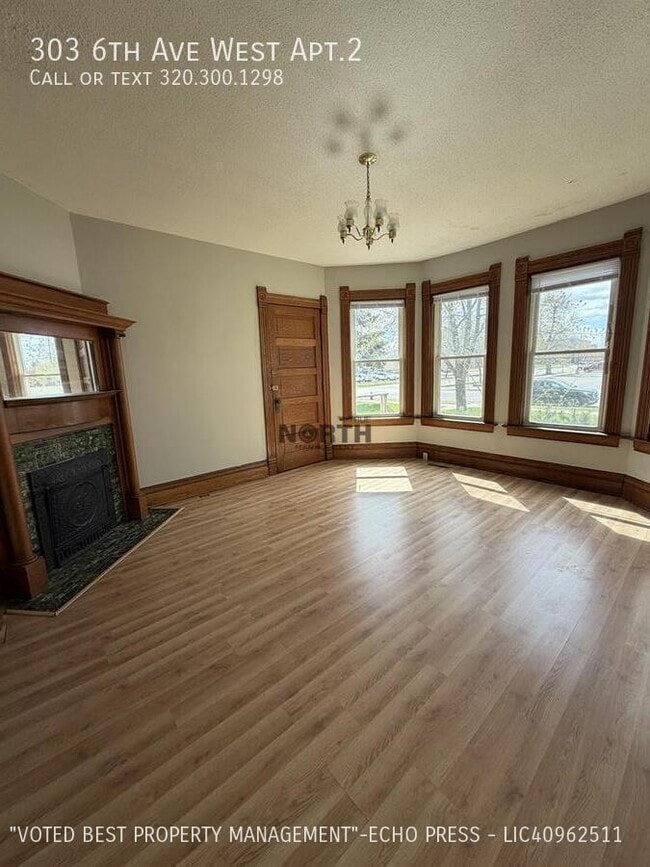 Building Photo - 303 6th Ave W