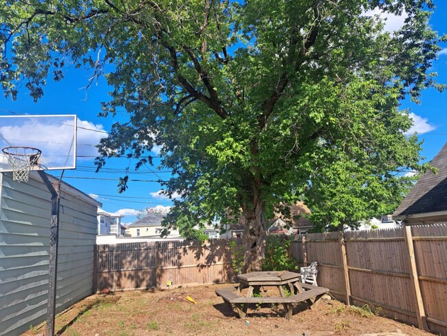 Picnic area, yard, and basketball hoop - 440 Kelley St