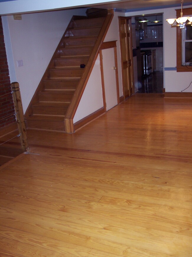 Living Room and Stairs Leading to Second Fl - 1930 Bank St