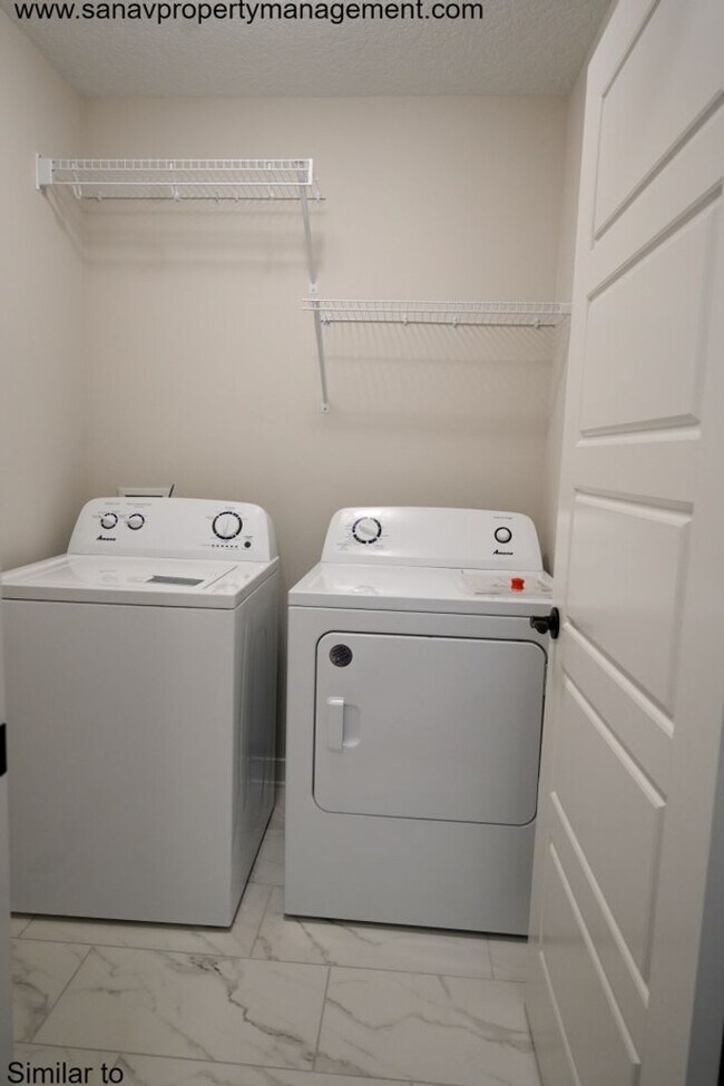 Building Photo - "Seize the Dream: Contemporary Comfort in West Des Moines including HOA "