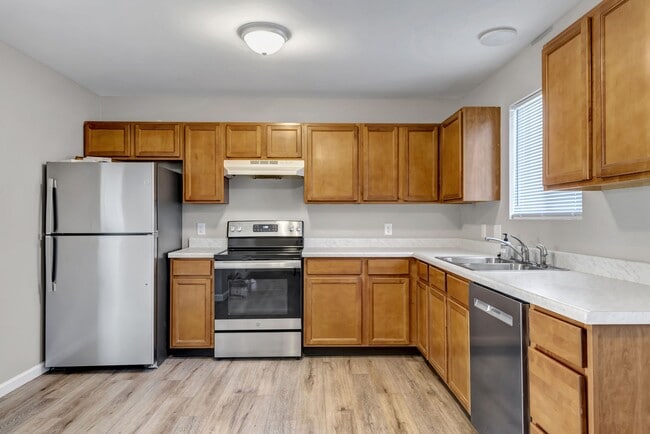 Kitchen with new stainless appliances - 21 Nassau Dr