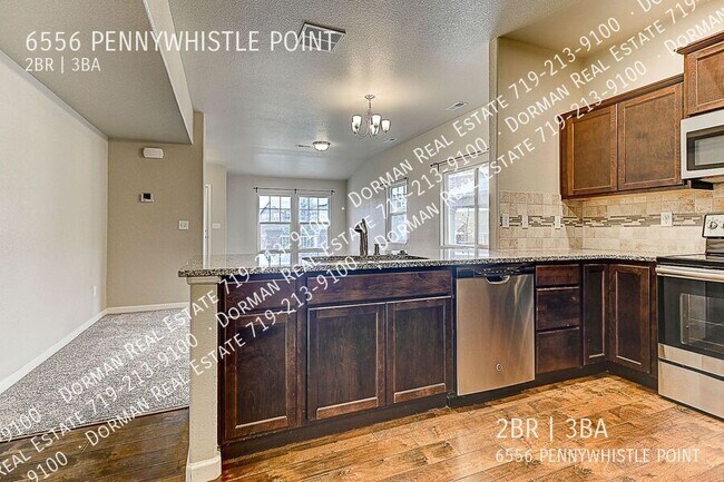 Foto del edificio - 6556 Pennywhistle Point