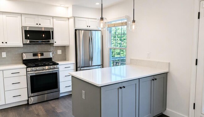 Foto del edificio - Charming Three-Bedroom Townhome in a Prime Ashburn Location