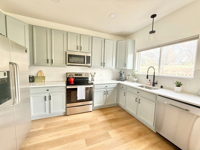 Building Photo - Remodeled home backs to open space!