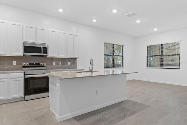 Foto del edificio - 1205 Butterfly Orchid Rd