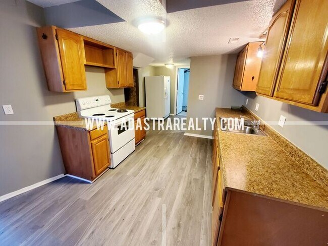 Building Photo - Totally Renovated 3 Bedroom Duplex in Inde...