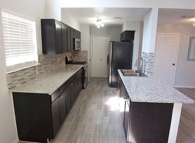 Foto del edificio - 1415 Grand Jct Dr