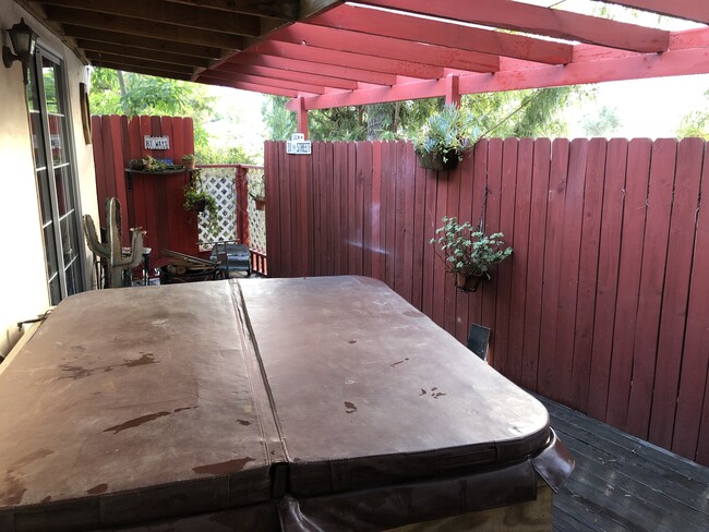 Patio with hot tub. - 4201 Topanga Canyon Blvd