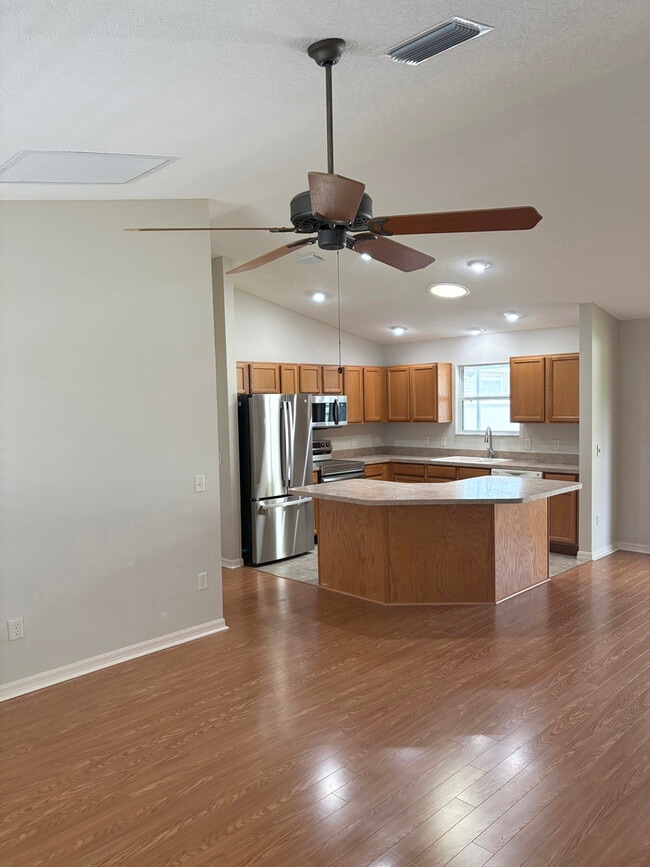 Kitchen from front entrance - 1631 Blossom Ter