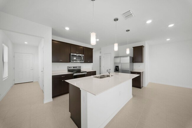 Foto del edificio - Newly constructed property offers four spacious bedrooms, two full bath in Lehigh Acres