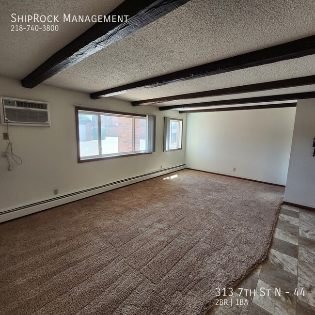 Building Photo - 313 7th St N