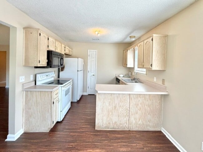 Photo - 6806 Skylar Mill Ave Apartment