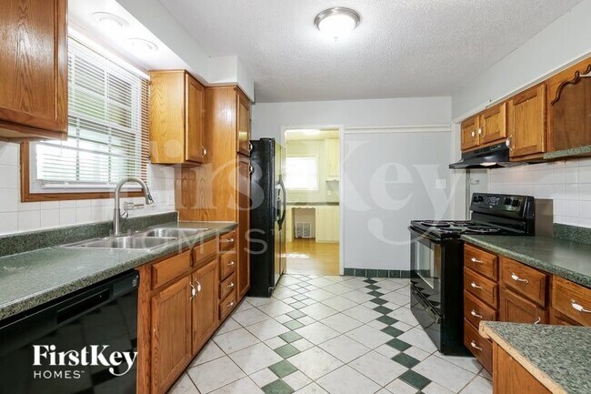 Foto del edificio - 1236 W 24TH St S