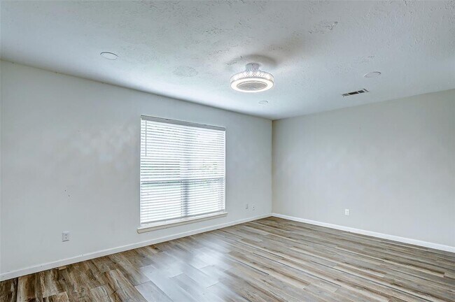 Building Photo - 6410 S Briar Bayou Dr