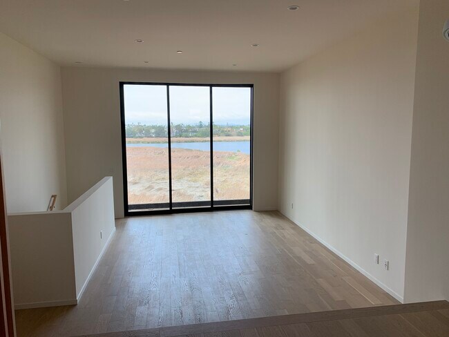 Living Room with lagoon and ocean views - 572 Laguna Dr