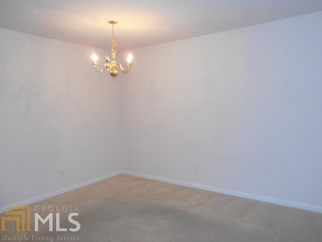 Building Photo - 4693 Creekside Villas Way