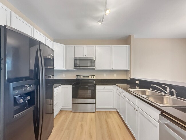 Building Photo - $0 DEPOSIT OPTION. UPDATED 2 BEDROOM CONDO...