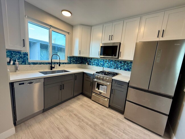 Building Photo - Wave of NEW - Must see this 2 bedroom 1 Ba...