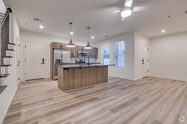 3BR, 2.5BA - 1867SF - Kitchen and Living Area - Reef Townhomes