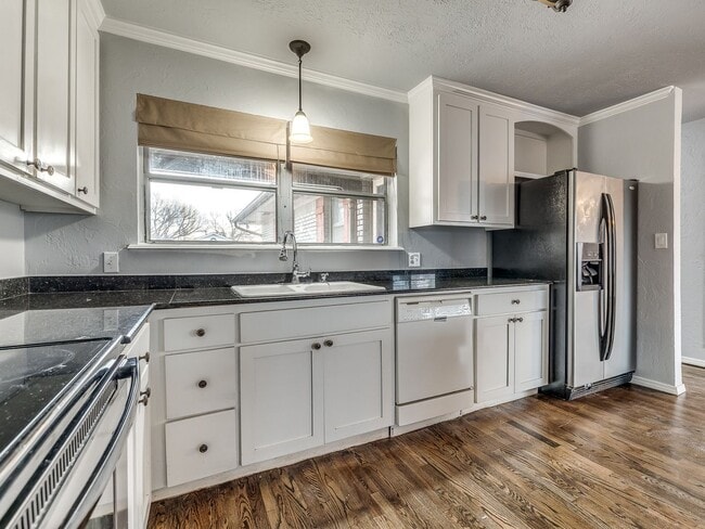 Building Photo - Live in the Heart of The Village | Stylish...