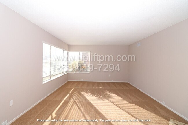 Building Photo - Adams &amp; Soria