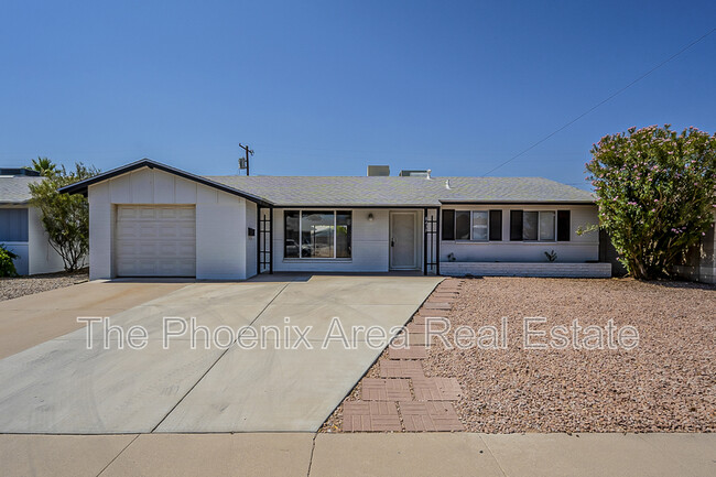 Building Photo - 8439 E Palm Ln