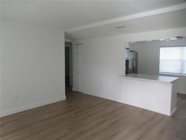 Building Photo - 7374 Royal Palm Dr