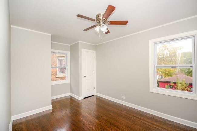 Building Photo - 10817 S Vernon Ave