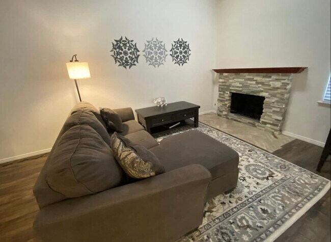 Living room and fireplace. - 2330 Collier Ct