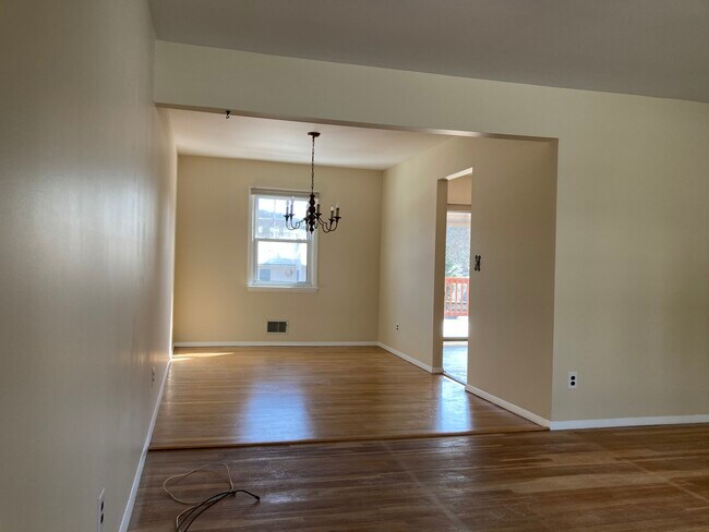 Living room view into dining room. - 14 Marianna Dr