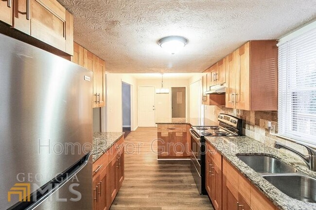Building Photo - 5051 Golfbrook Dr