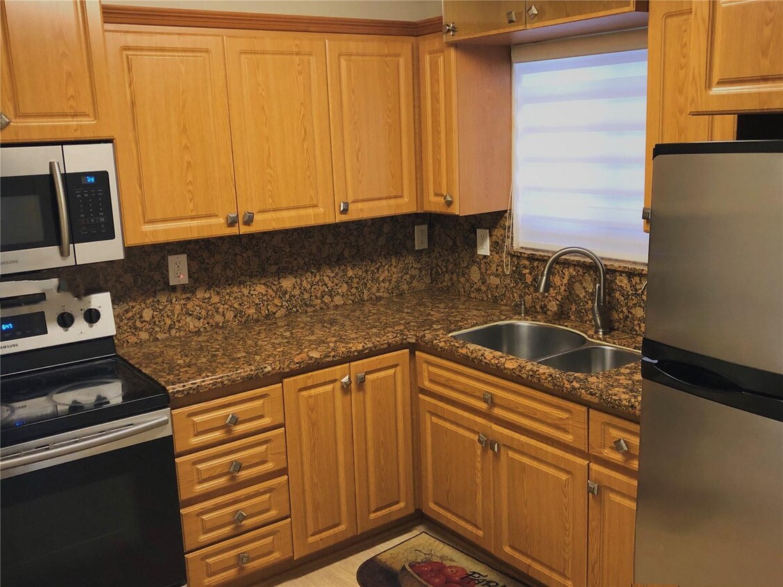 Foto principal - 6800 Harding Ave
