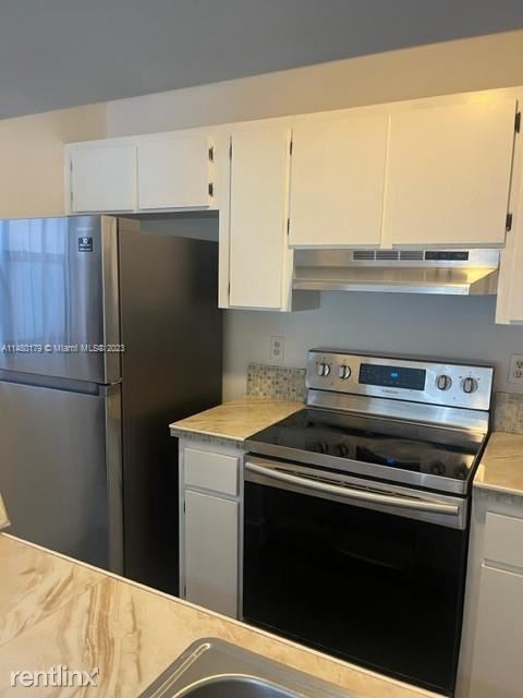 Building Photo - 3 br, 2 bath House - 9702 Hammocks Blvd Ap...