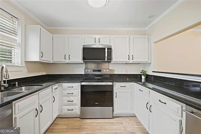 Photo - 911 Hollyfax Cir NE Apartment