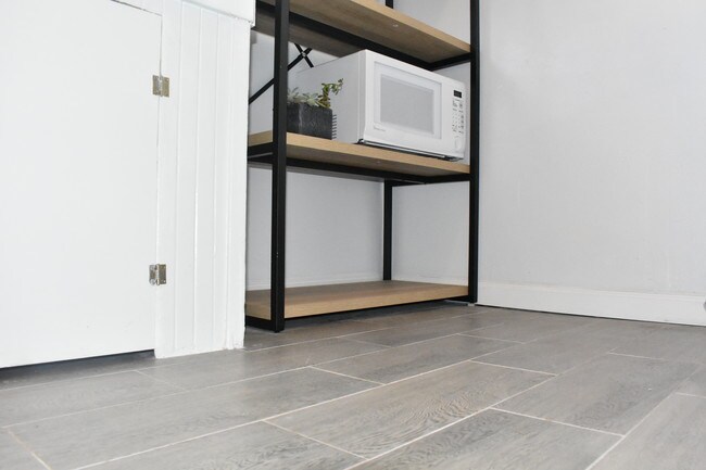 microwave, tile floor - 378 Arleta Ave