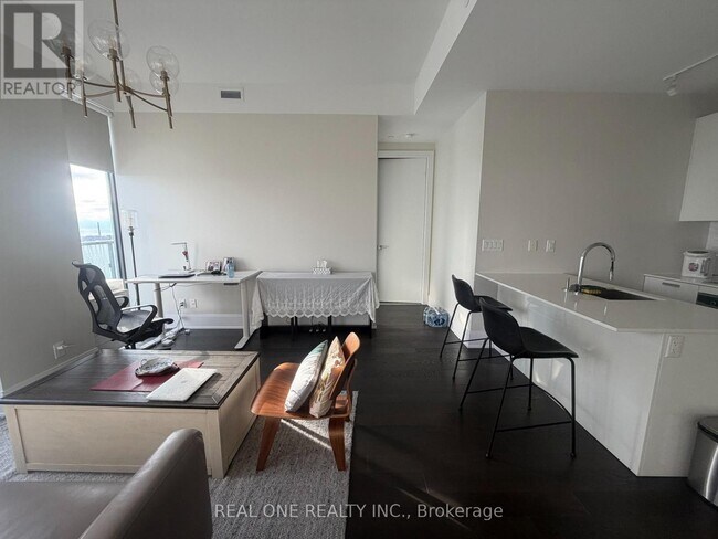 Building Photo - 50 Charles St E