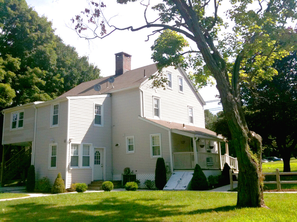 Large lawn with off-street parking - 6255 Main St