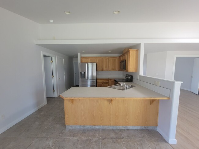 Building Photo - 4-Bedroom Gem in Pasco – Fresh Paint, New ...