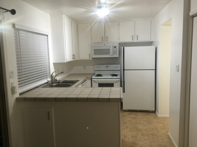 Building Photo - 8740 Woodman Way