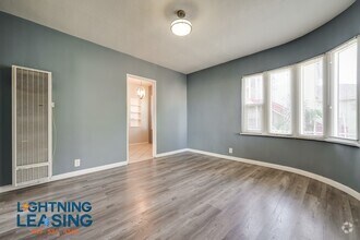 Building Photo - 6415 S Van Ness Ave