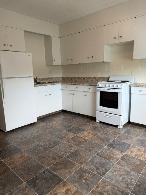 Photo du bâtiment - 931-931 6th Ave N