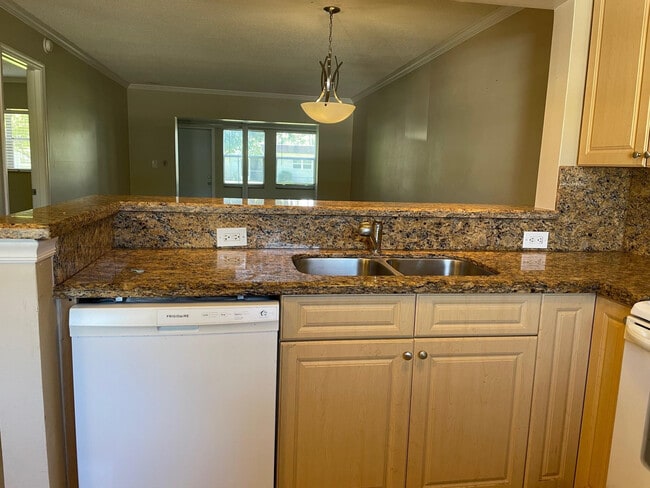 Building Photo - 608 SW Natura Blvd