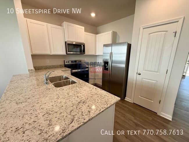 Foto del edificio - 10 Sweetspire Dr NW