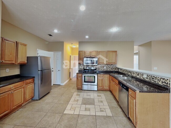 Foto del edificio - 5039 Weatherstone Dr