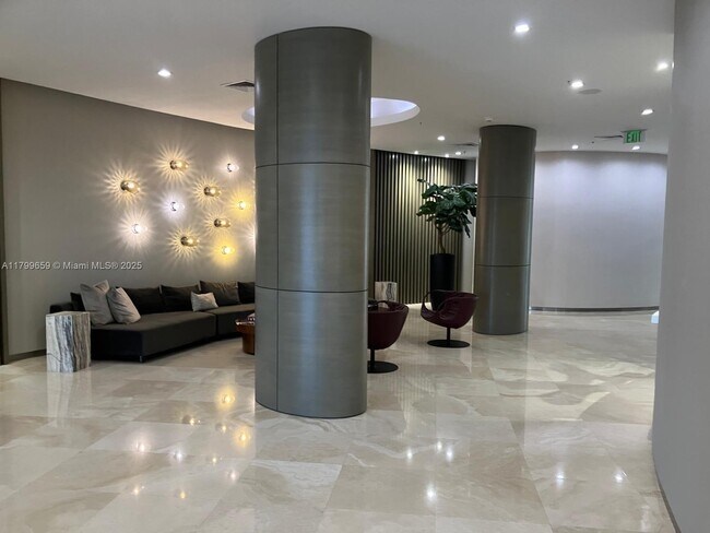 Building Photo - 10275 Collins Ave