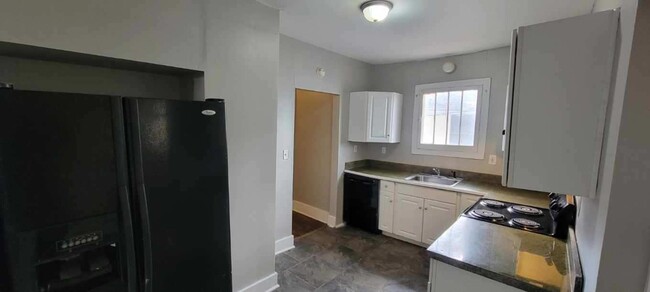 Building Photo - A charming 3-bedroom, 1.5-bathroom ( Pictu...