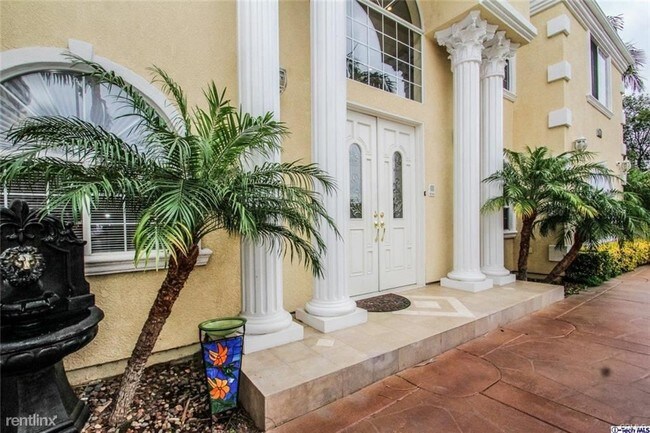 Foto del edificio - 3 br, 3.5 bath House - 7735 Winnetka Ave