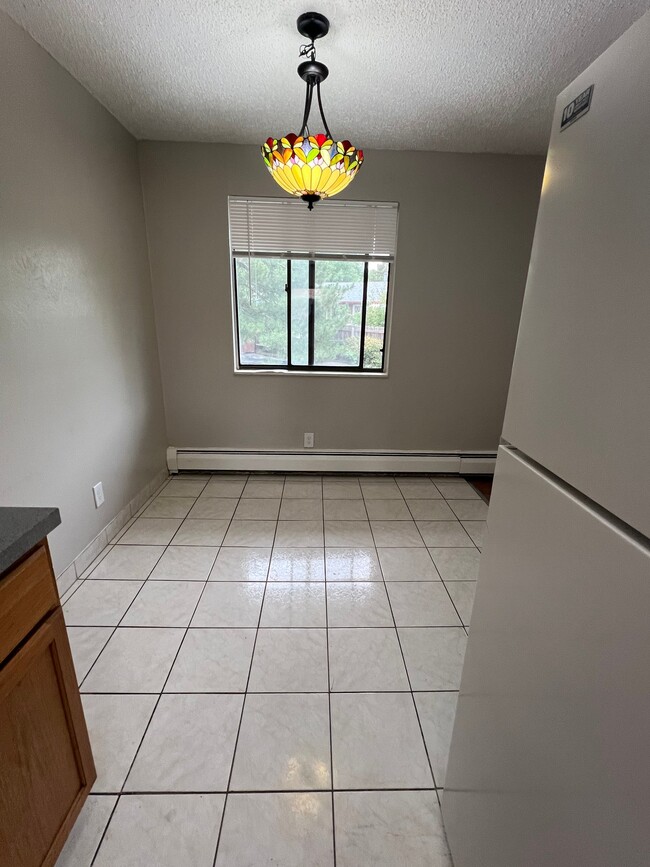 Building Photo - 9277 W 56th Pl